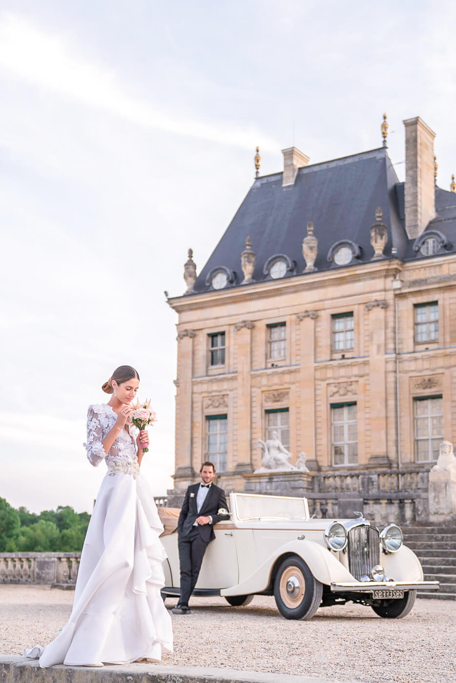 Couple kissing on Eiffel Tower terrace, Shangri-La Paris, with fireworks and roses.